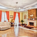 The living room with fireplace in the private house